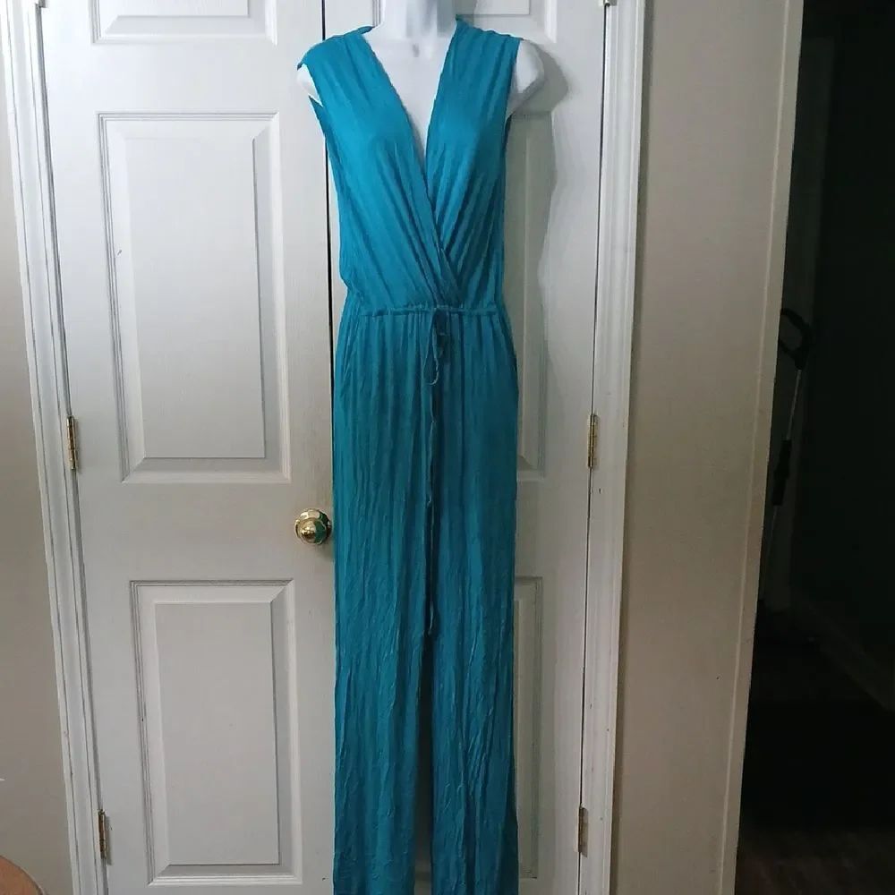 Ropalia teal sleeveless jumpsuit with side pockets Sz L EUC
